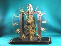 Torquato Tasso (Massafiscaglia 1765 - Ferrara 1842), Orologio, 1829; vetro e ferro su base di legno laccato nero.